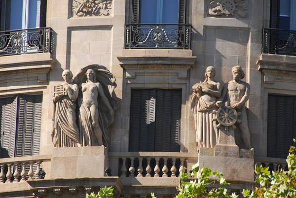 Sculpture group on the faade of Edificio La Unin y el Fnix