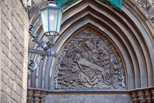 Tympanum of the Piet, Barcelona Cathedral, attributed to Miquel Luch, Carrer de la Pietat
