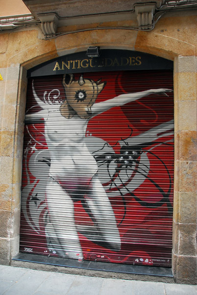 Artwork on the shutter of an antique dealer, Barcelona
