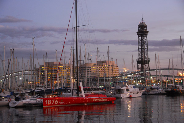 Port Vell, Barcelona waterfront at dusk with Torre Jaume I (1931)