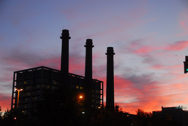 Industrial chimneys of the Endesa power plant at the base of Montjuc with a beautiful red sky