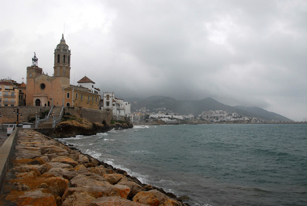 Església de Sant Bartomeu, Sitges waterfront on a cloudy day