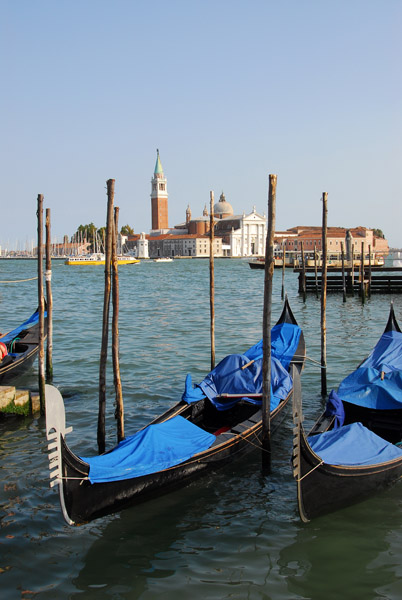 A pair of gondolas in front of the Doge's Palace