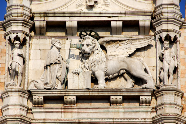The Doge kneeling before the Lion of St. Mark, tympanum of the Doge's Palace
