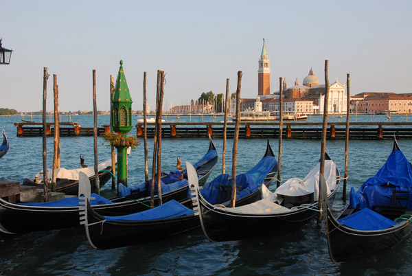 Gondolas tied up along the Molo in front of the Doge's Palace, Venice