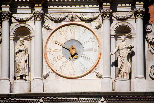 Bartolomeo Monopola's clock above the portico overlooking the Doge's Palace courtyard