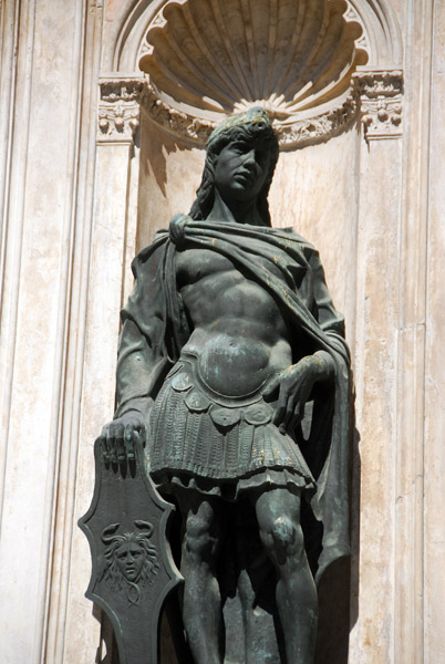 Bronze sculpture of a page symbolizing fidelity in a niche on the Foscari Arch