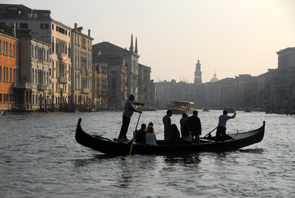 A San Tom gondola ferries passengers across the Grand Canal in Venice