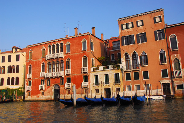 Goldolas tied up in front of Palazzo Giustinian Persico, to the right of Rio di Tom