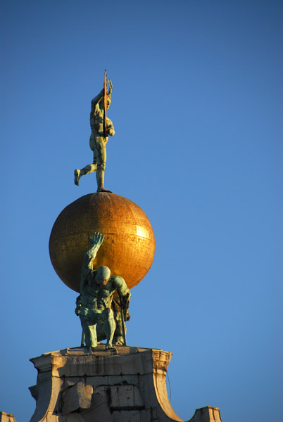 Two bronze Atlases supporting a globe with Fortuna acting as a weathervane, Old Customs House, Punta della Dogana