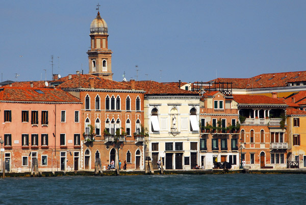 Like the Grand Canal, Canale della Giudecca is lined with old houses, though these are much more modest