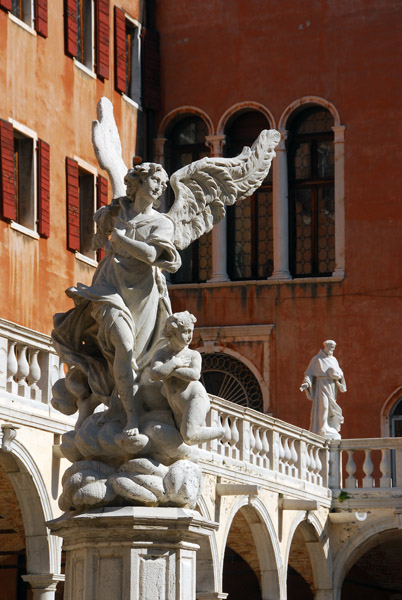Sculpture of an Angel in the cloister of i Frari