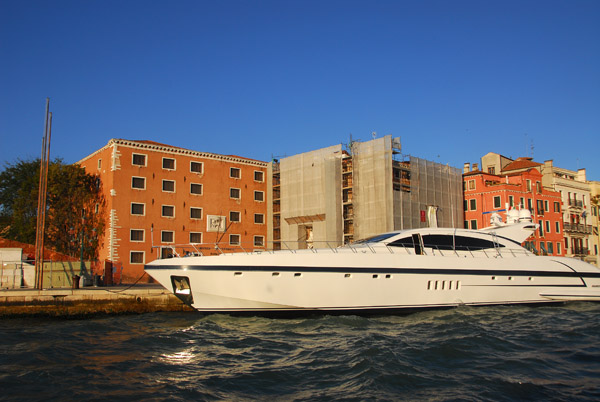 Slick yacht tied up in front of the Museo Storico Navale di Venezia