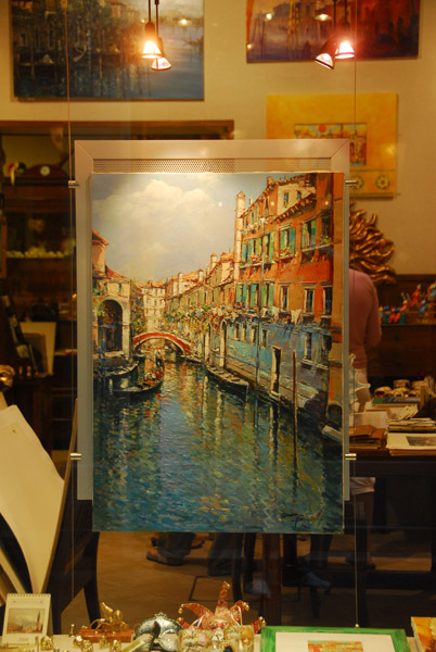 Art on display in the window of a Venice gallery