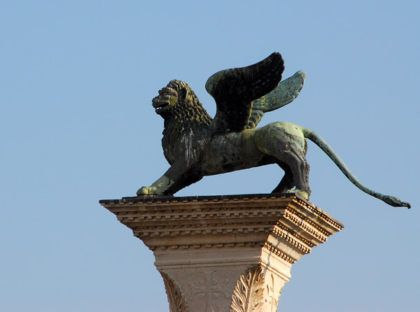 The Lion of St. Mark on top of the column Marco marking the gate to Venice, Piazzetta San Marco