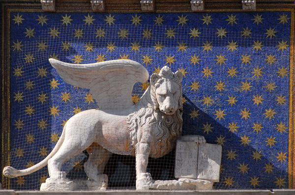 Lion of St. Mark on the Clock Tower in front of a field of blue stars