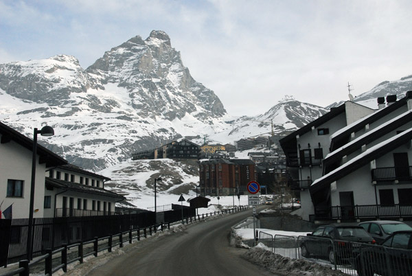 Road through the village of Cervinia, Italy, beneath the Matterhorn