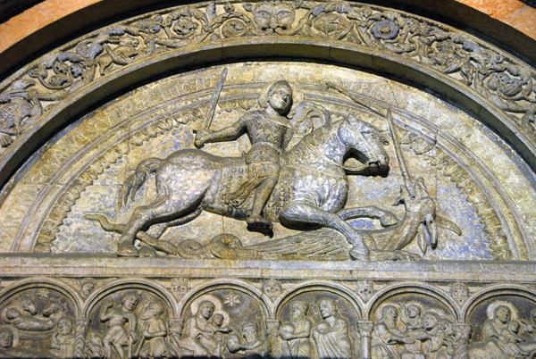 Statue of St. George over the main door of the Duomo, Ferrara,