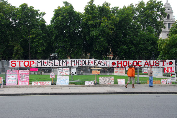 Middle East protest posters in front of Parliament, London