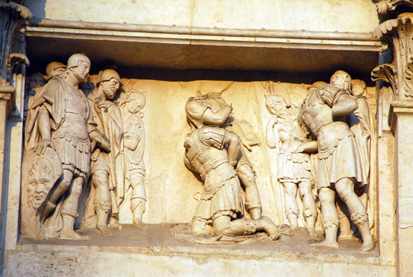 Damaged relief of the Execution of St. Fidelis of Como, Milan