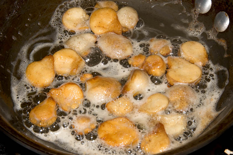 sliced gem studded puffballs in butter