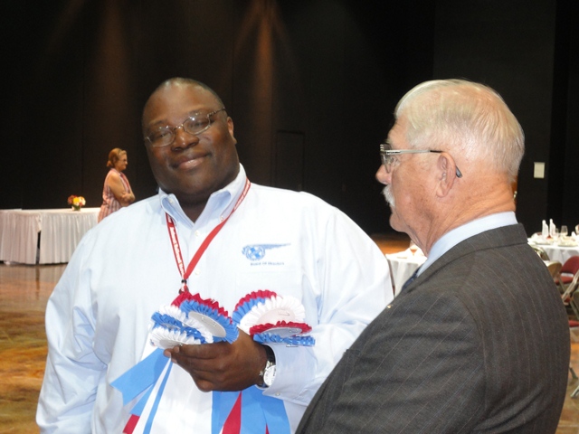 Ramon presenting the bounty to Joe McMillan