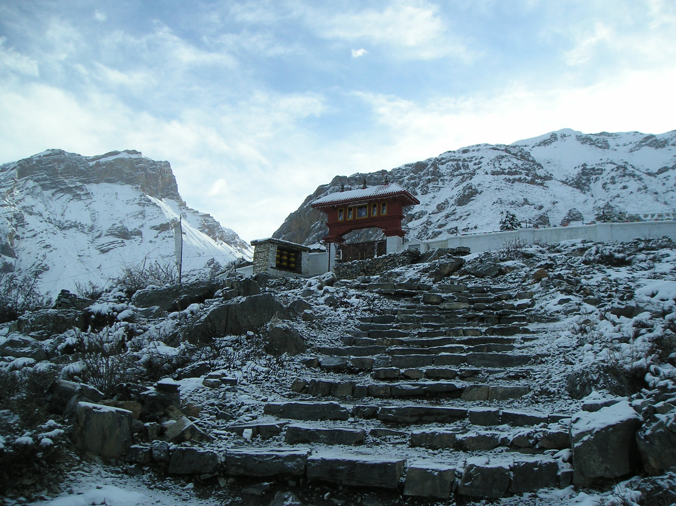 Start climbing the steps leading to the temple