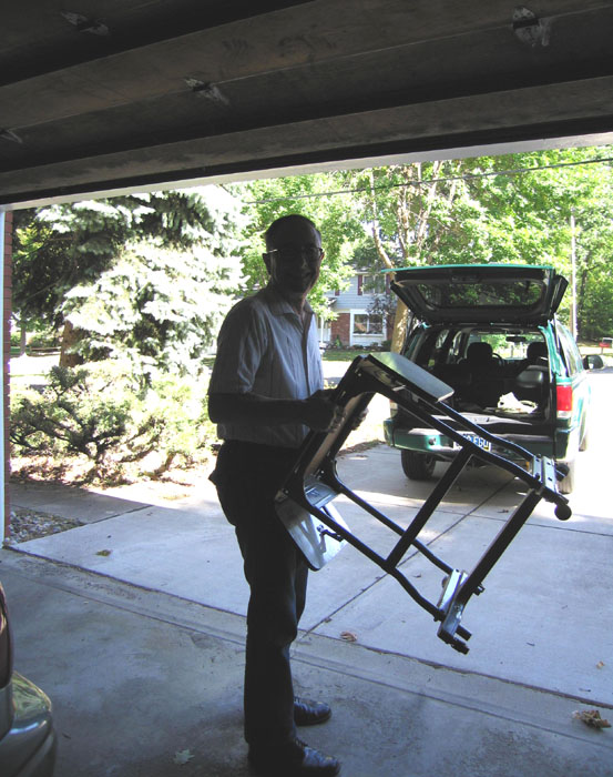 David removing a typewriter table