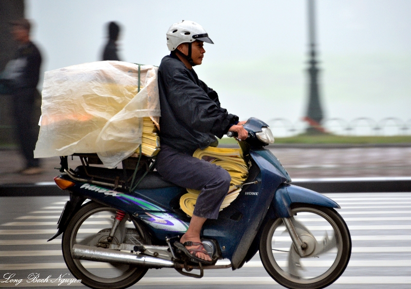 keeping dry Hanoi, Vietnam  