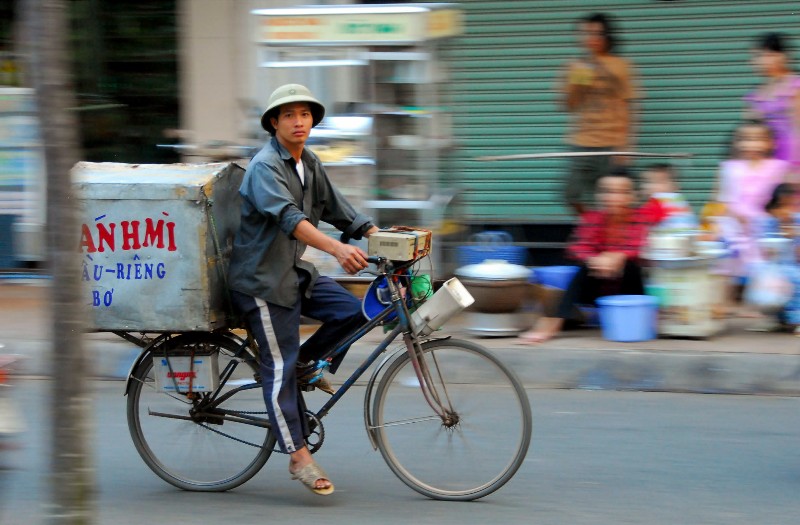 Selling meat sandwich on bike