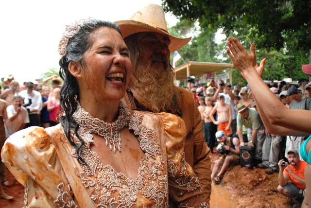 Redneck Wedding Couple enjoy a Dip in the Mudbath