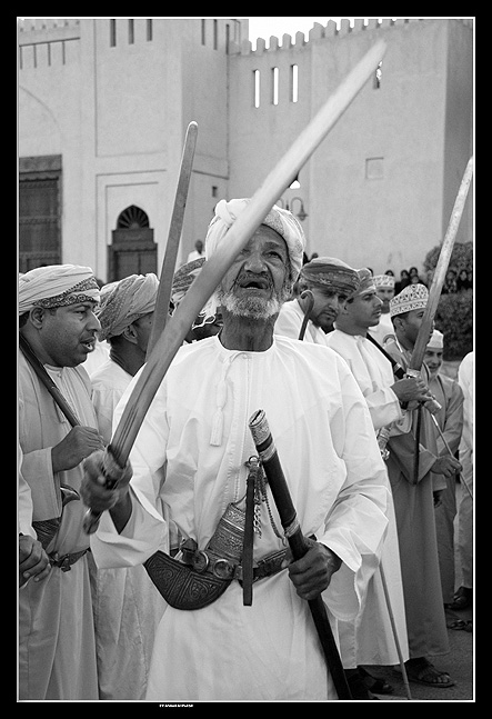 Omani men performing Razha (Folklore Dance)