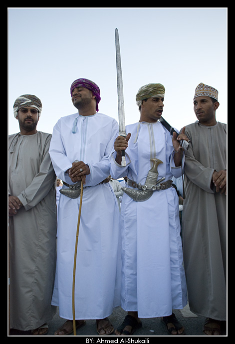 Omani men performing Razha (Folklore Dance)
