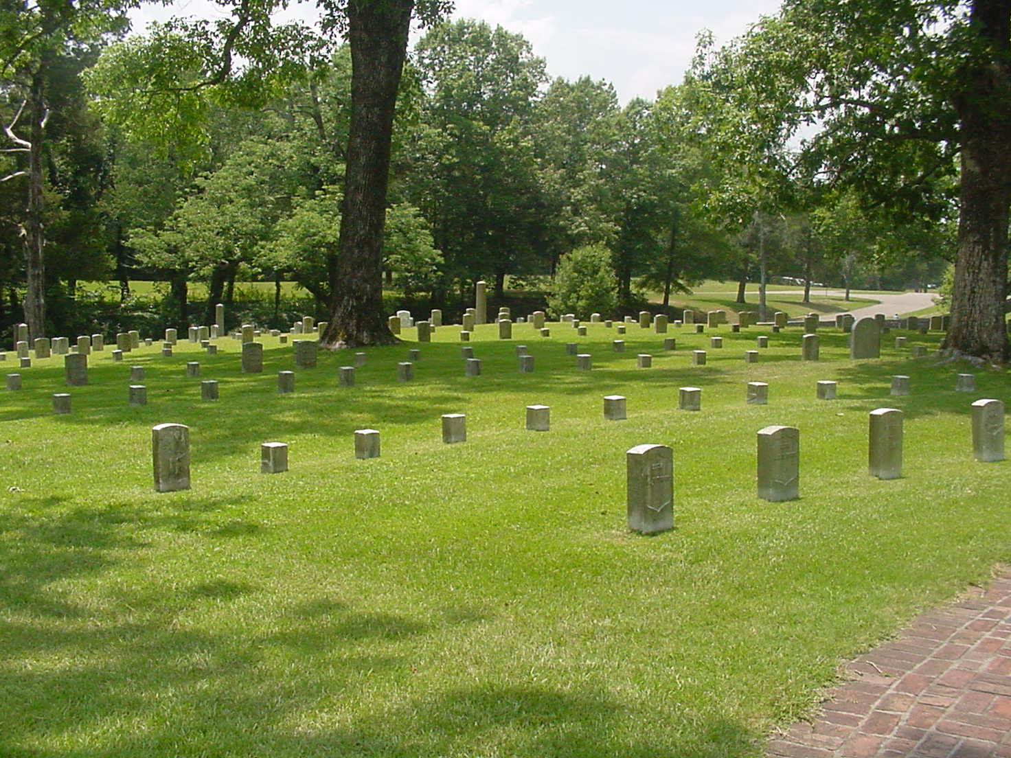 The smaller markers are for those soldiers who are not identified.  Sadly, this would be the majority of those buried at Shiloh.