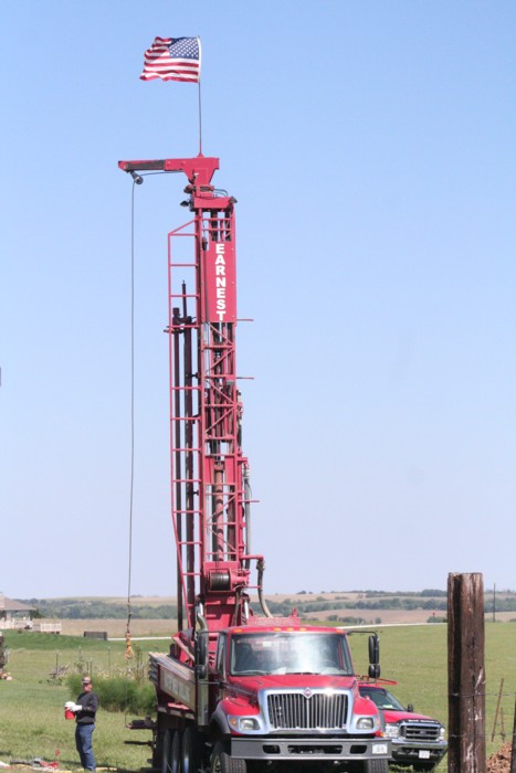 Well Digging Machinery With a Flag