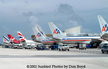 Lineup of tails on Concourses A and B at MIA - AA B757-223 N671AA airliner aviation stock photo