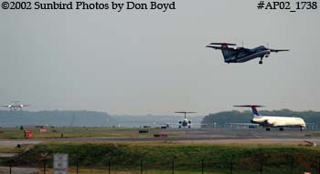 Dual runway usage at Ronald Reagan Washington National Airport aviation stock photo #AP02_1738