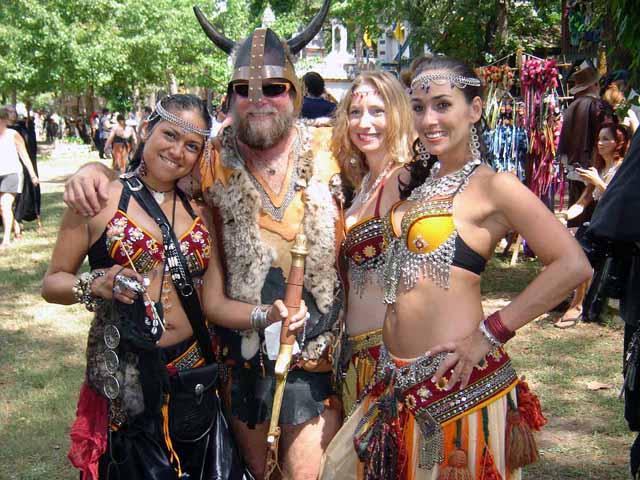 Hmmmmmm, looks like this barbarian got his own fashion show girls