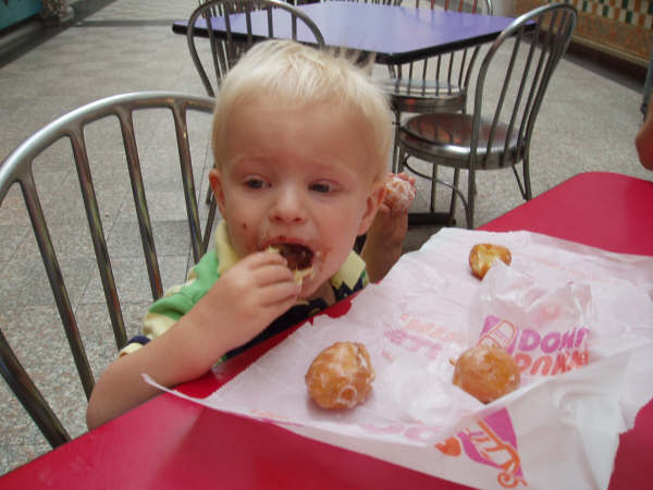 Conner eating his first do-nut at DFCI