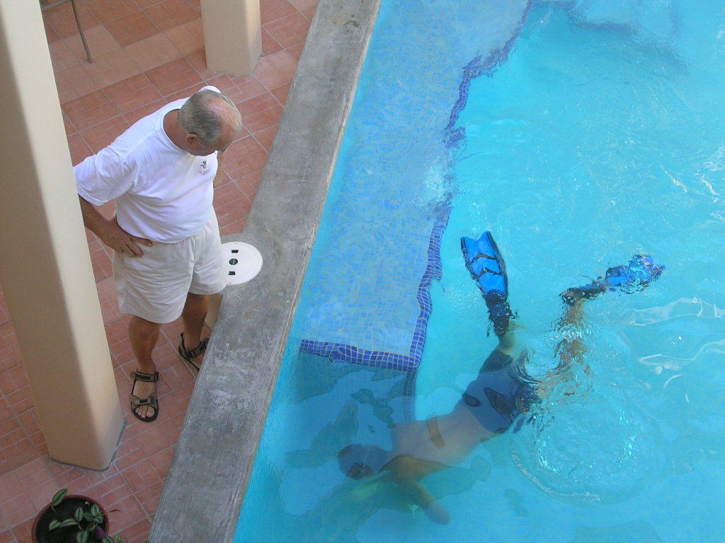 Michael giving the new pool a final brushing