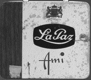  A tin of La Paz small cigars, that opened the door and a heart