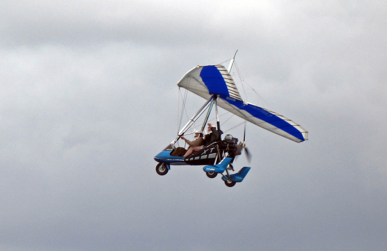 Dale in the back seat of powered hang glider (taken by Stan, the homeowner of house we stayed at)