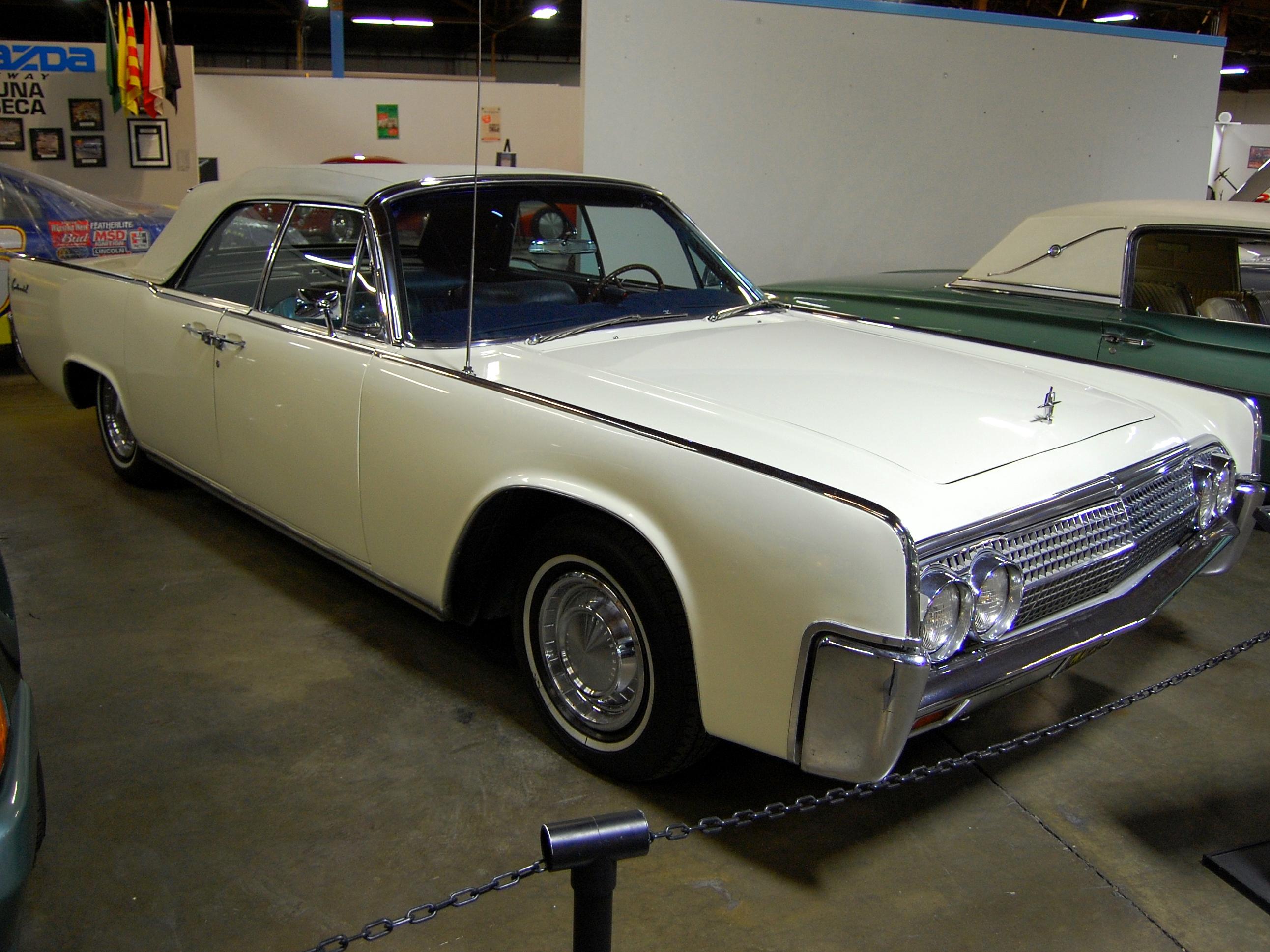 1963 Lincoln convertible suicide 4-dr sedan