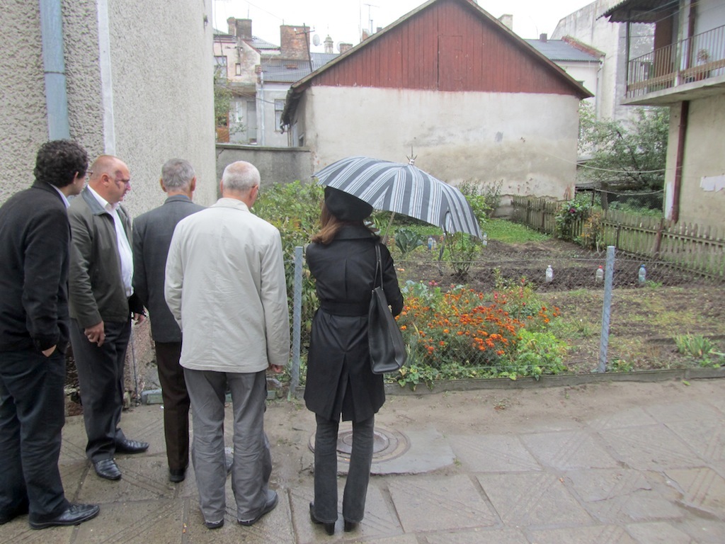 Mr. Vorobets leads us all on a tour of headstones yet to be moved to the new cemetery