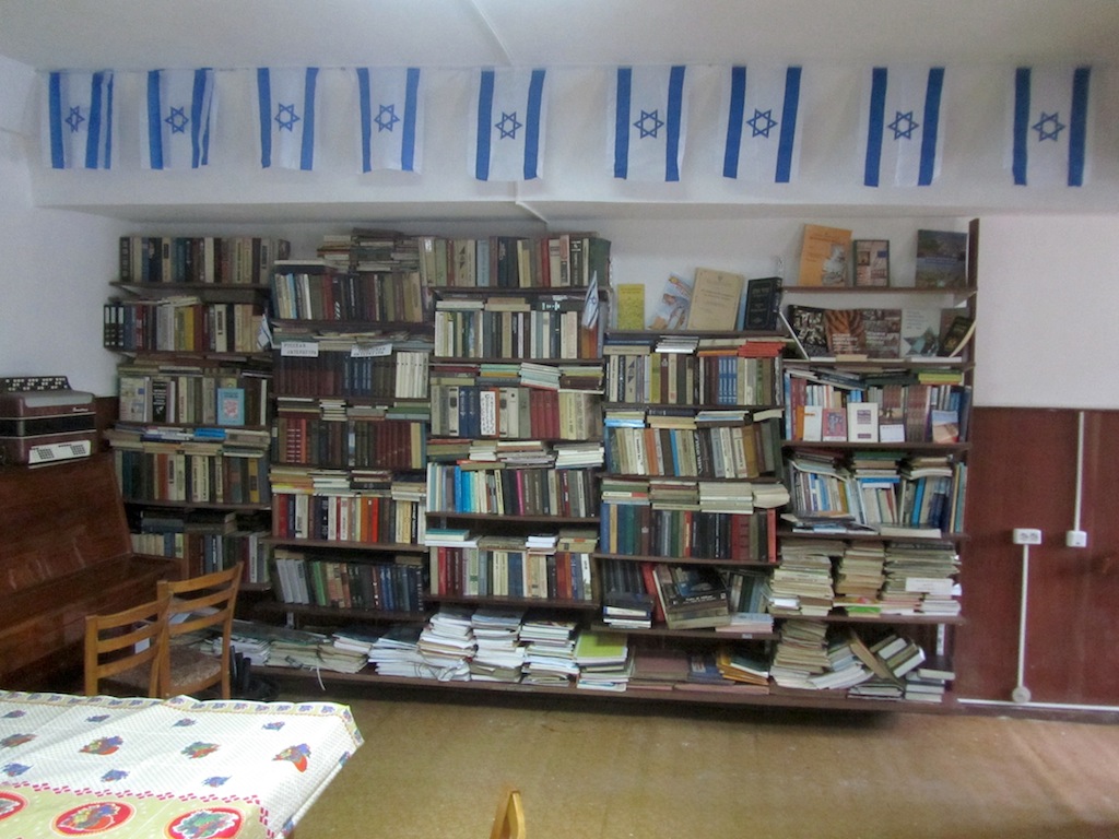 the library, with books on Jewish topics...