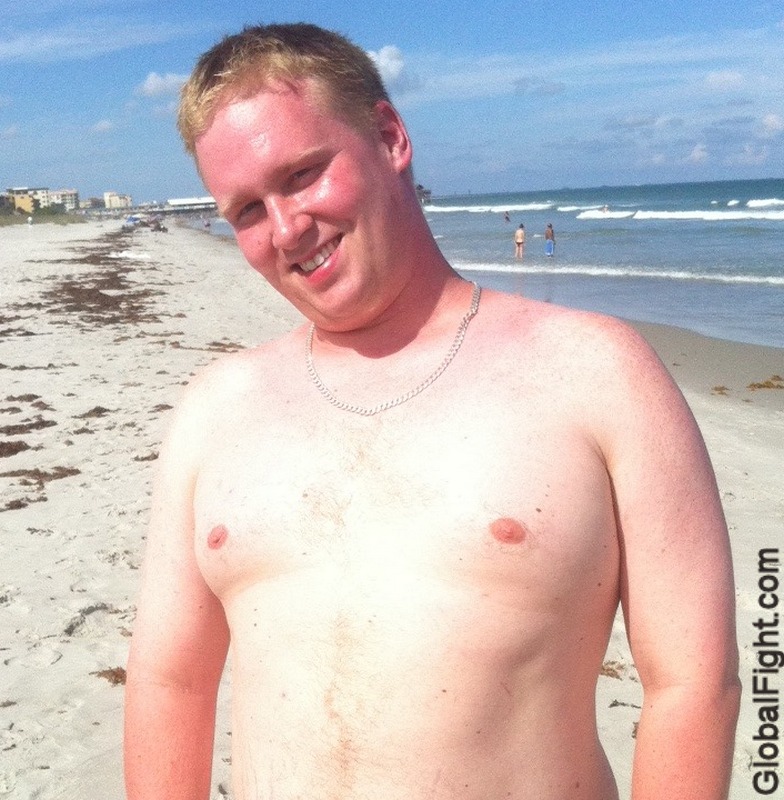 brother swimming playing at beach sandy.jpg