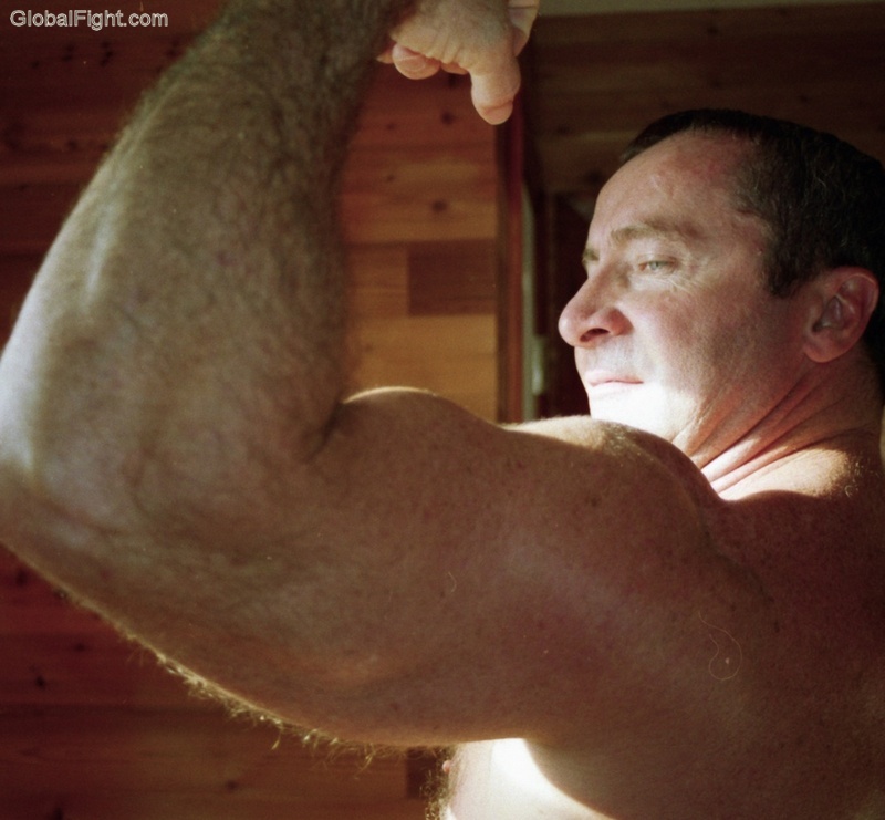 big huge hairy arms biceps redneck man.jpg