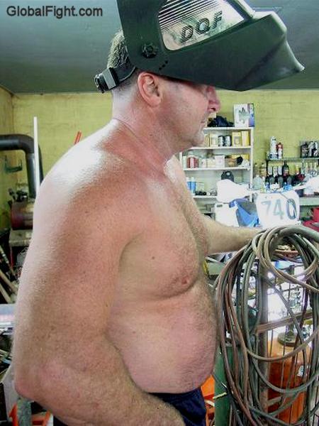 hairychest mechanic shirtless garage working men.jpg