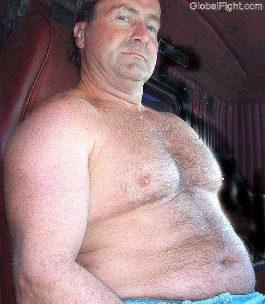 trucker shirtless sitting in cab beefy hairy belly.jpg