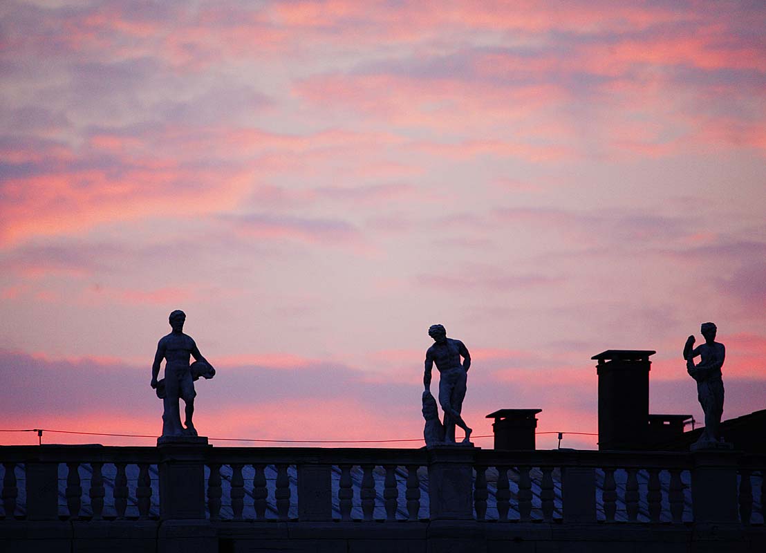 Sunset over the statues